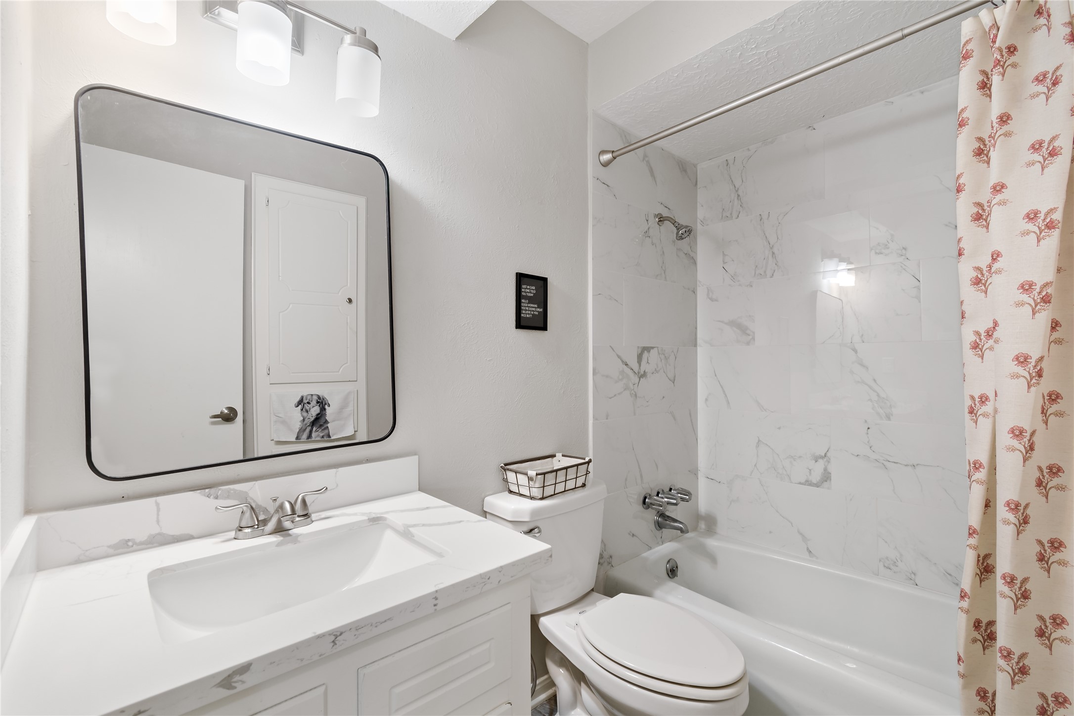 4302 Seneca Street Pasadena, TX 77504 - Photo 15 of 19 a bathroom with a sink a toilet and shower