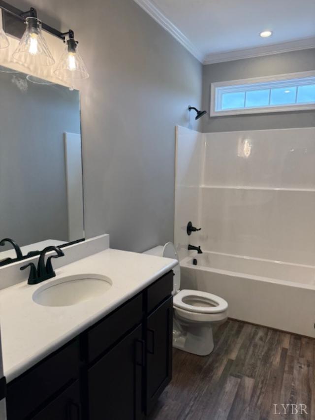 2779 Oakville Road Appomattox, VA 24522 - Photo 13 of 31 a bathroom with a sink a toilet and a mirror