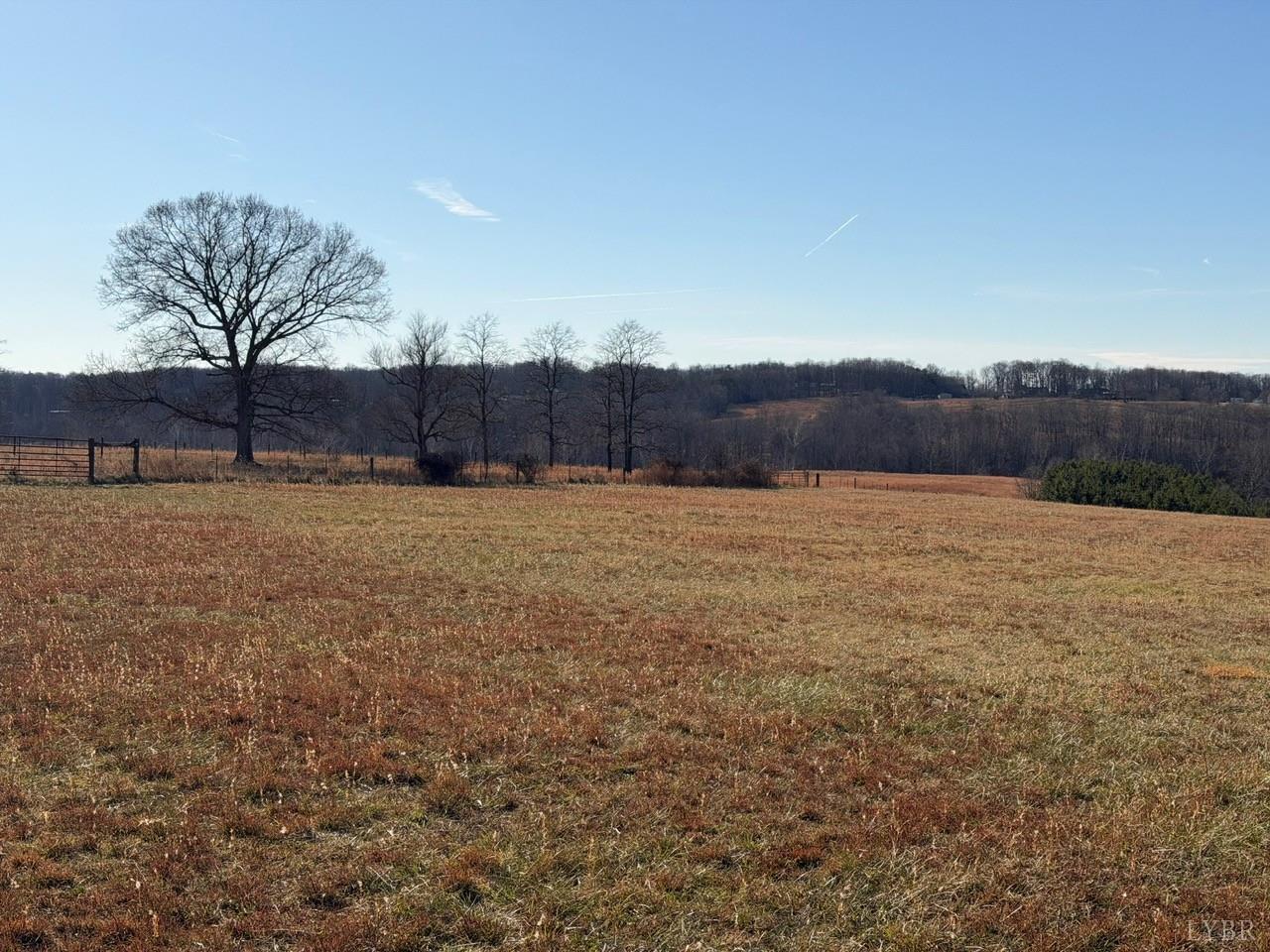 2779 Oakville Road Appomattox, VA 24522 - Photo 22 of 31 a view of a yard with wooden fence