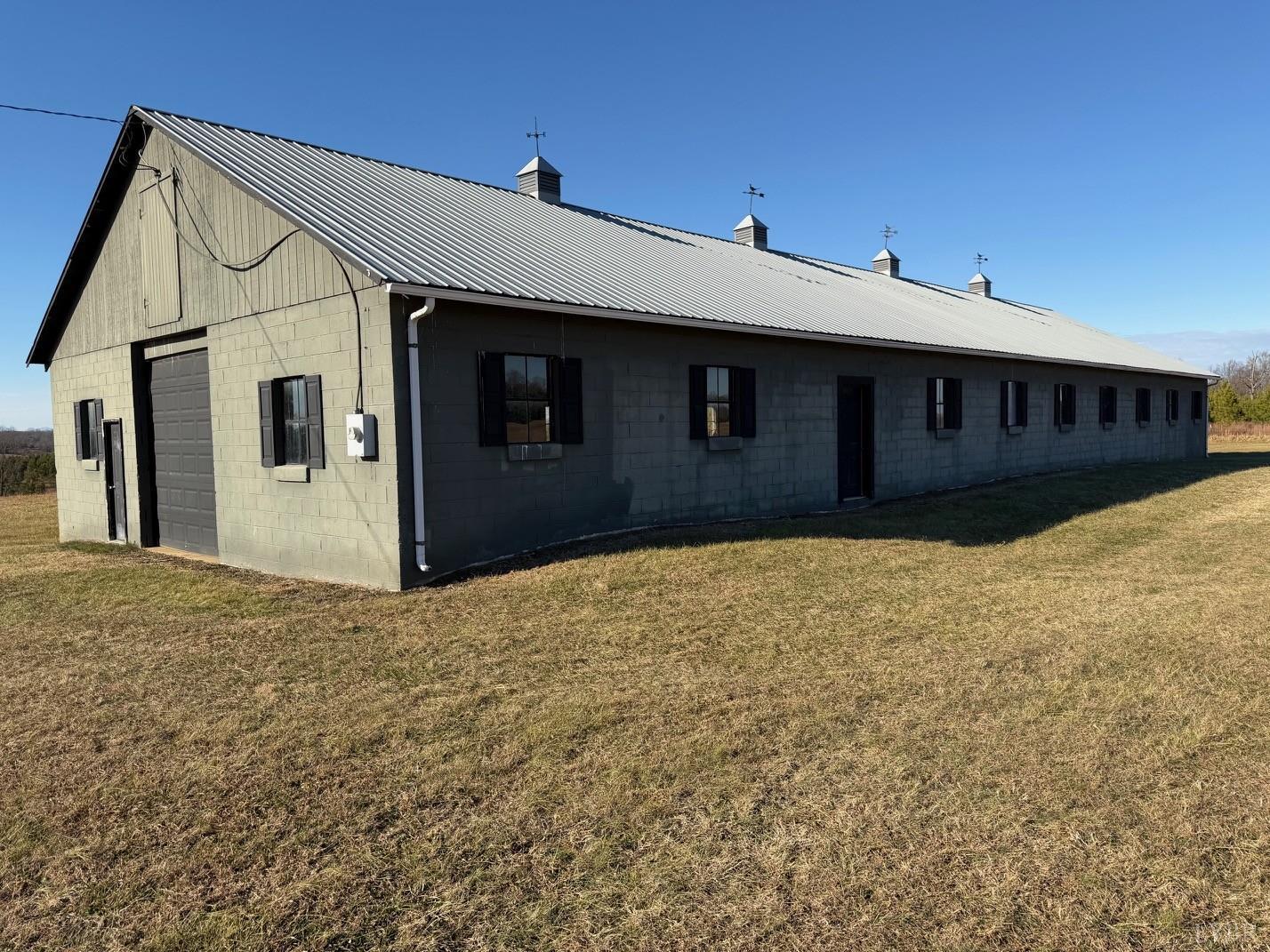 2779 Oakville Road Appomattox, VA 24522 - Photo 26 of 31 a front view of a house with a yard