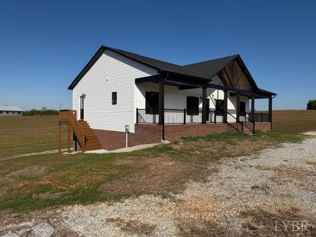 2779 Oakville Road Appomattox, VA 24522 - Photo 3 of 31 a view of a house with backyard and ocean view