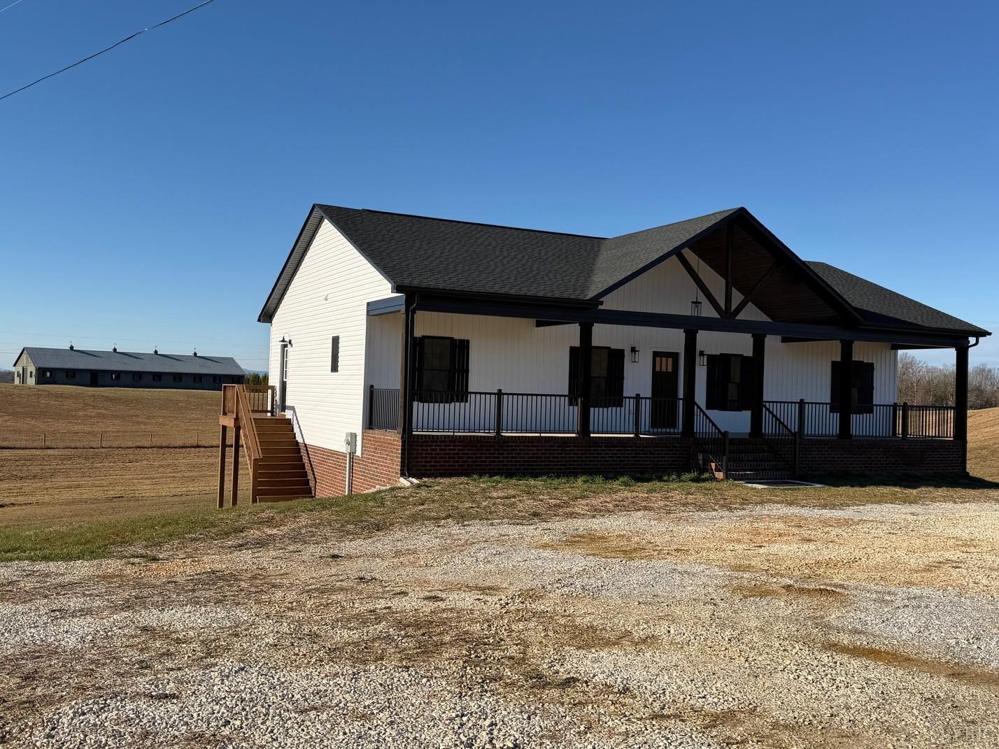 2779 Oakville Road Appomattox, VA 24522 - Photo 31 of 31 a house with a large tree in front of it