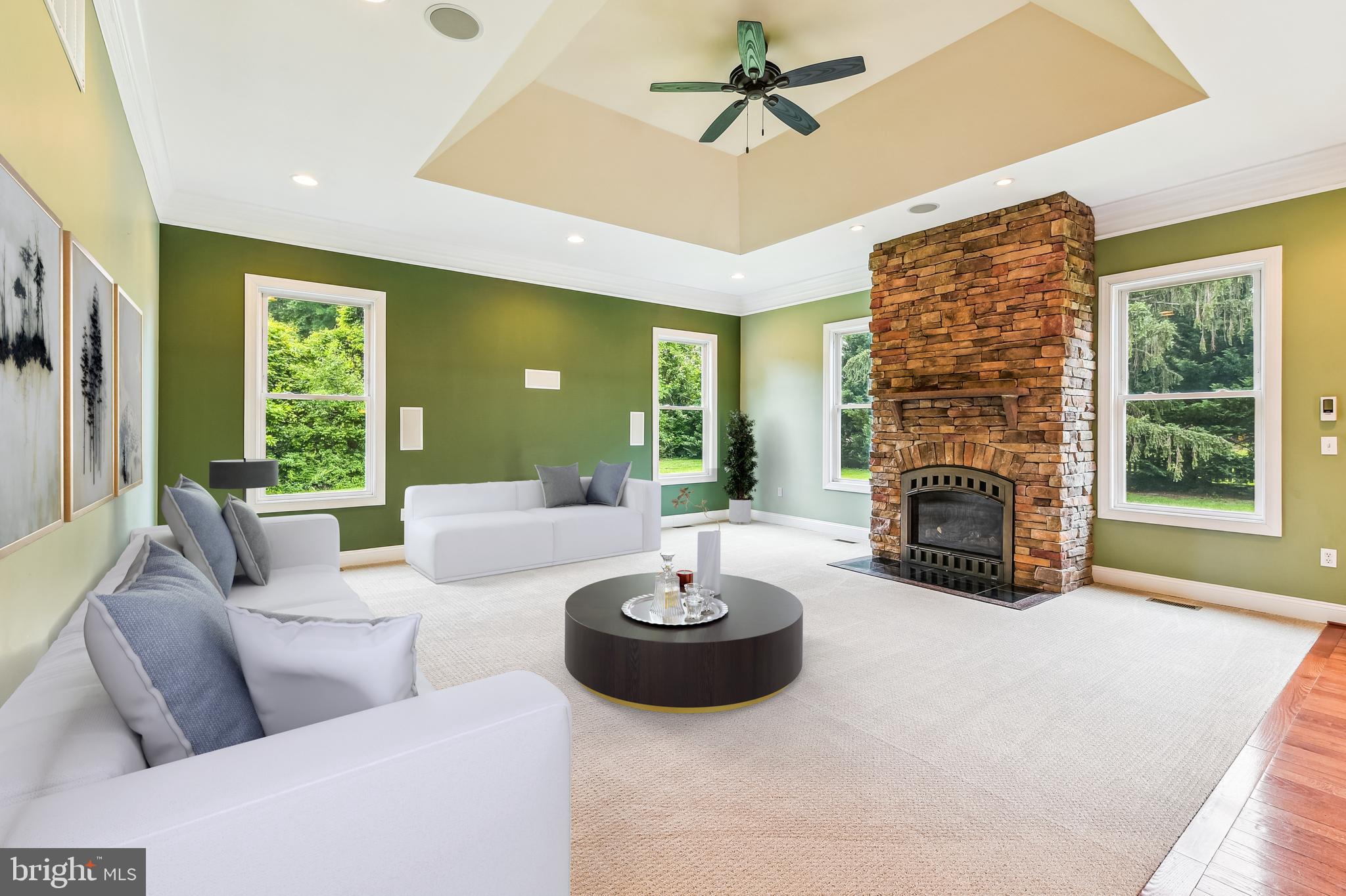 222 Wicklow Road Glen Burnie, MD 21061 - Photo 12 of 39 a living room with furniture a fireplace and a large window