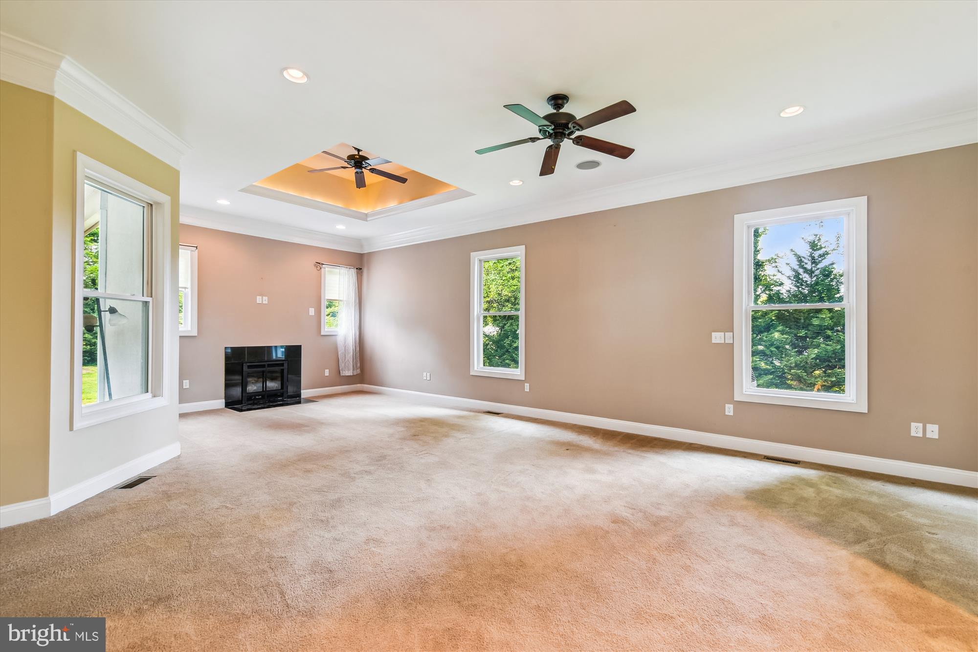 222 Wicklow Road Glen Burnie, MD 21061 - Photo 18 of 39 a view of a livingroom with a window and a fireplace