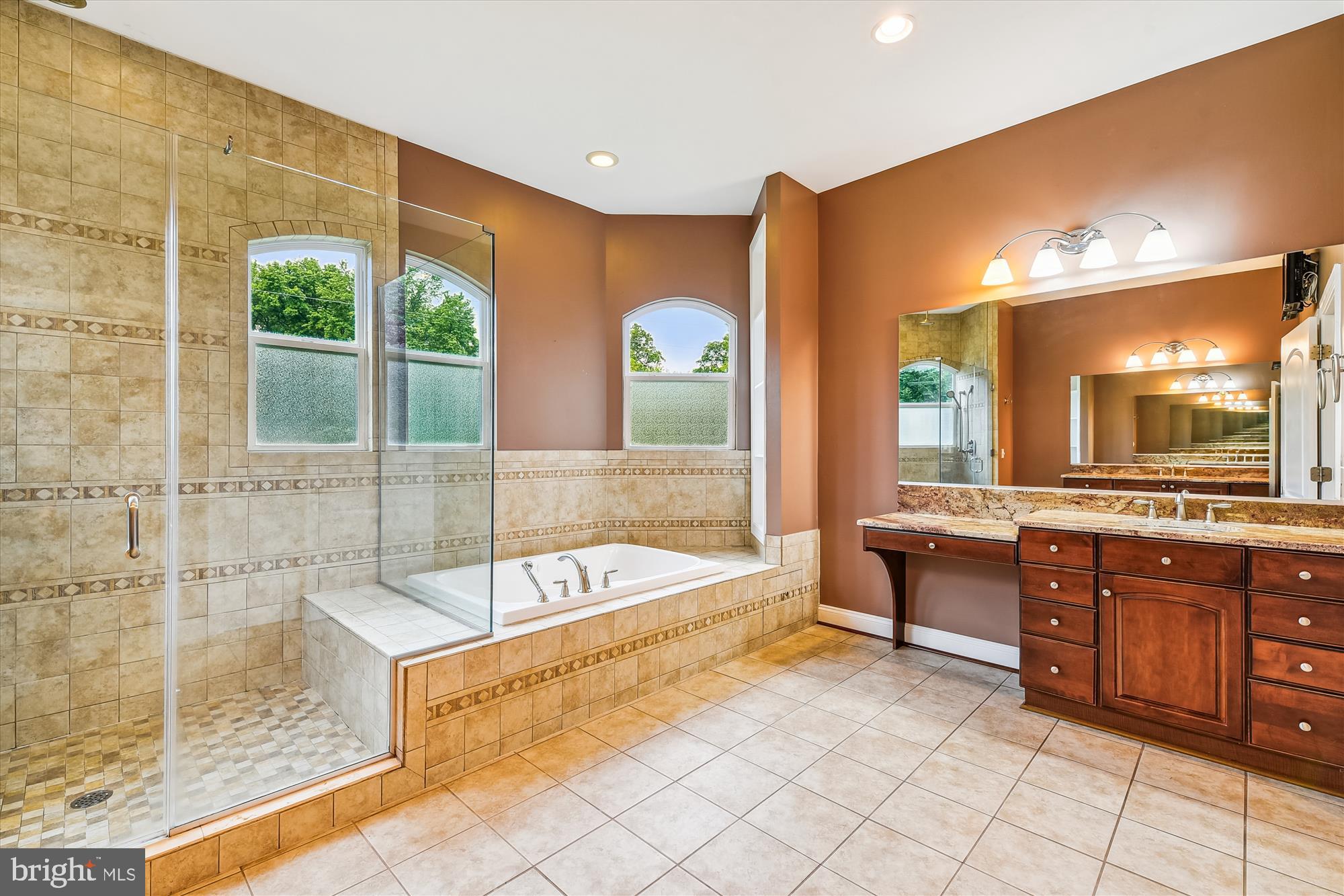 222 Wicklow Road Glen Burnie, MD 21061 - Photo 21 of 39 a spacious bathroom with a tub sink and mirror