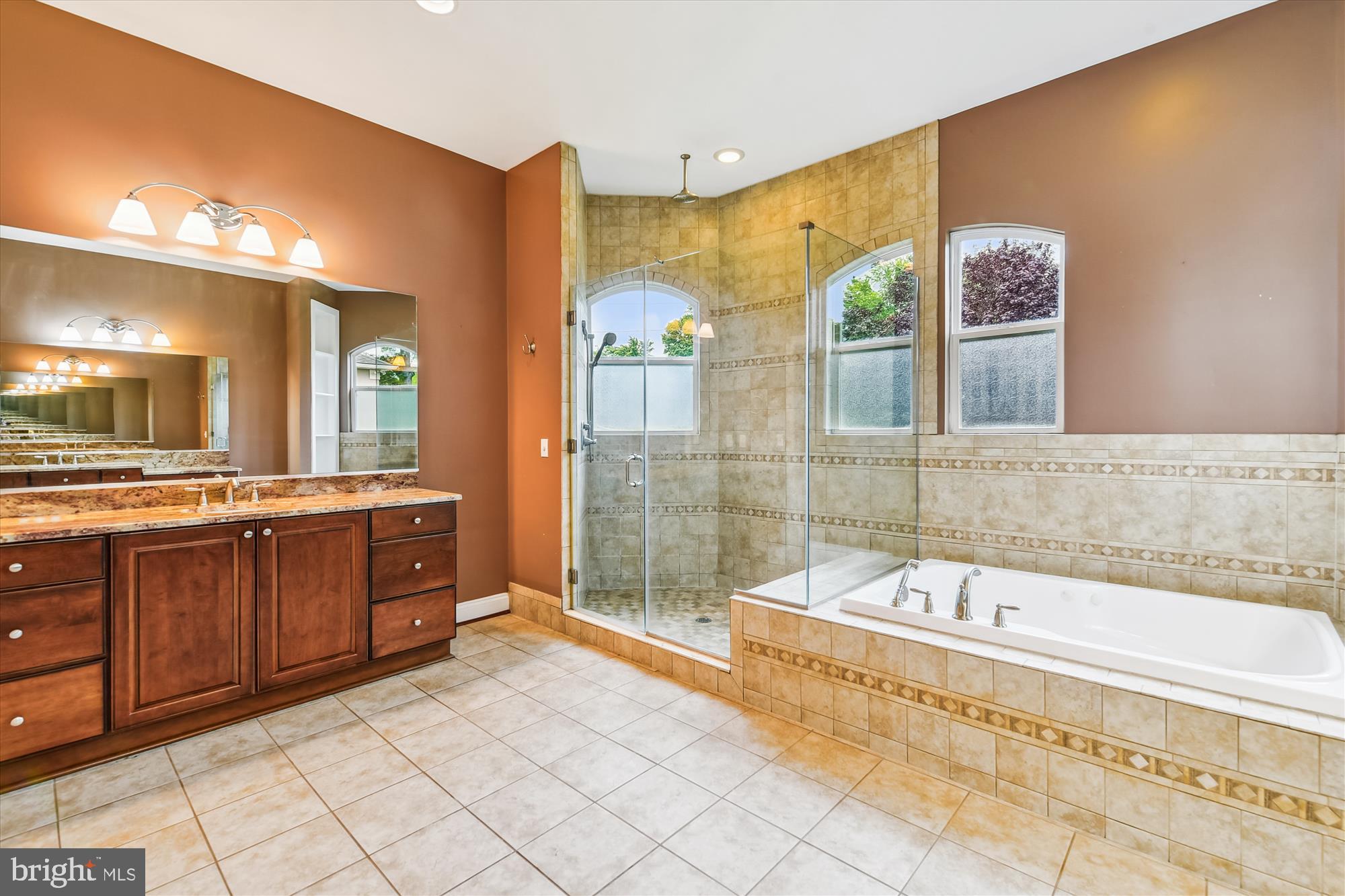 222 Wicklow Road Glen Burnie, MD 21061 - Photo 22 of 39 a spacious bathroom with a tub sink and mirror