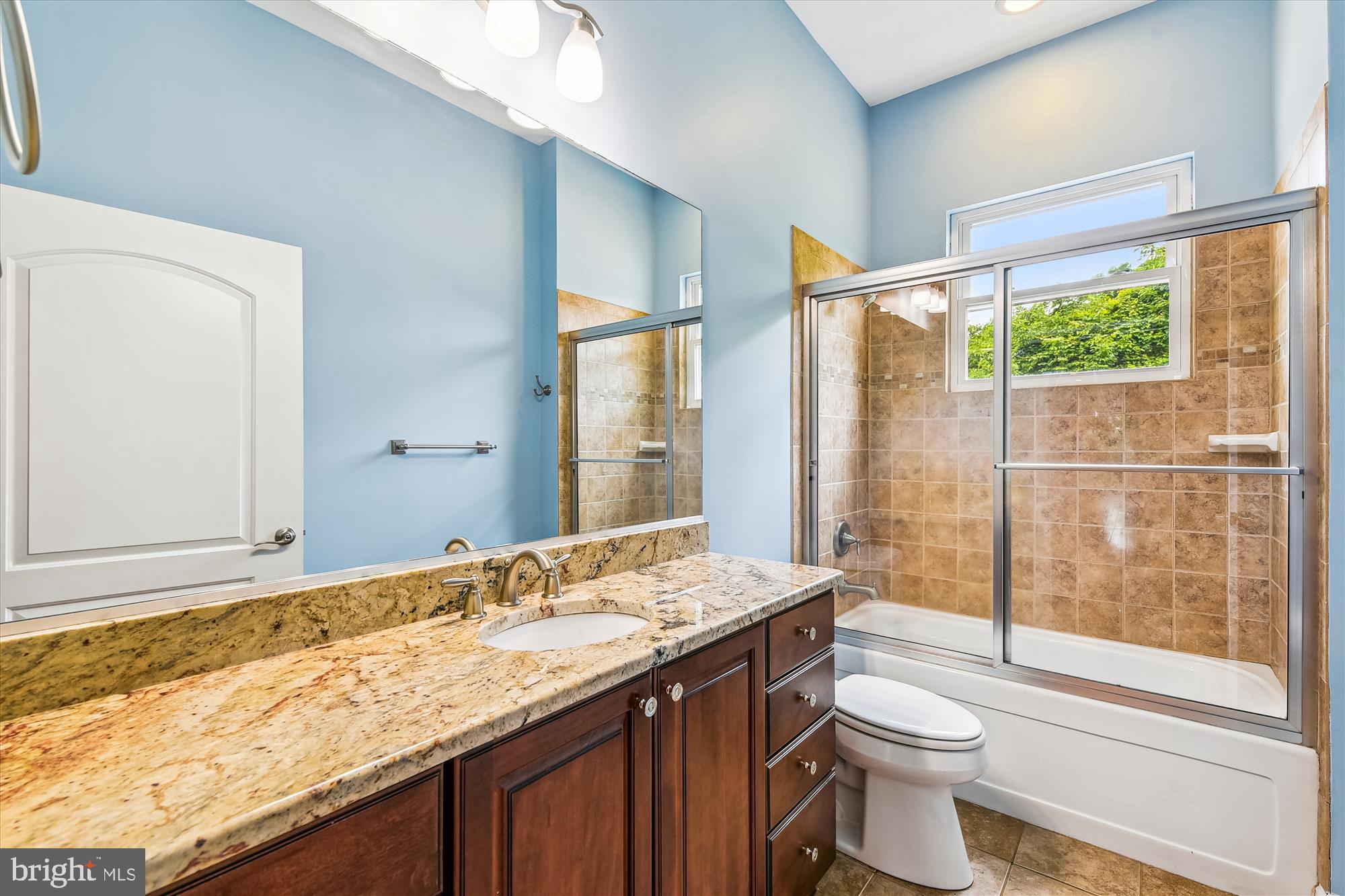 222 Wicklow Road Glen Burnie, MD 21061 - Photo 25 of 39 a bathroom with a granite countertop sink toilet and shower