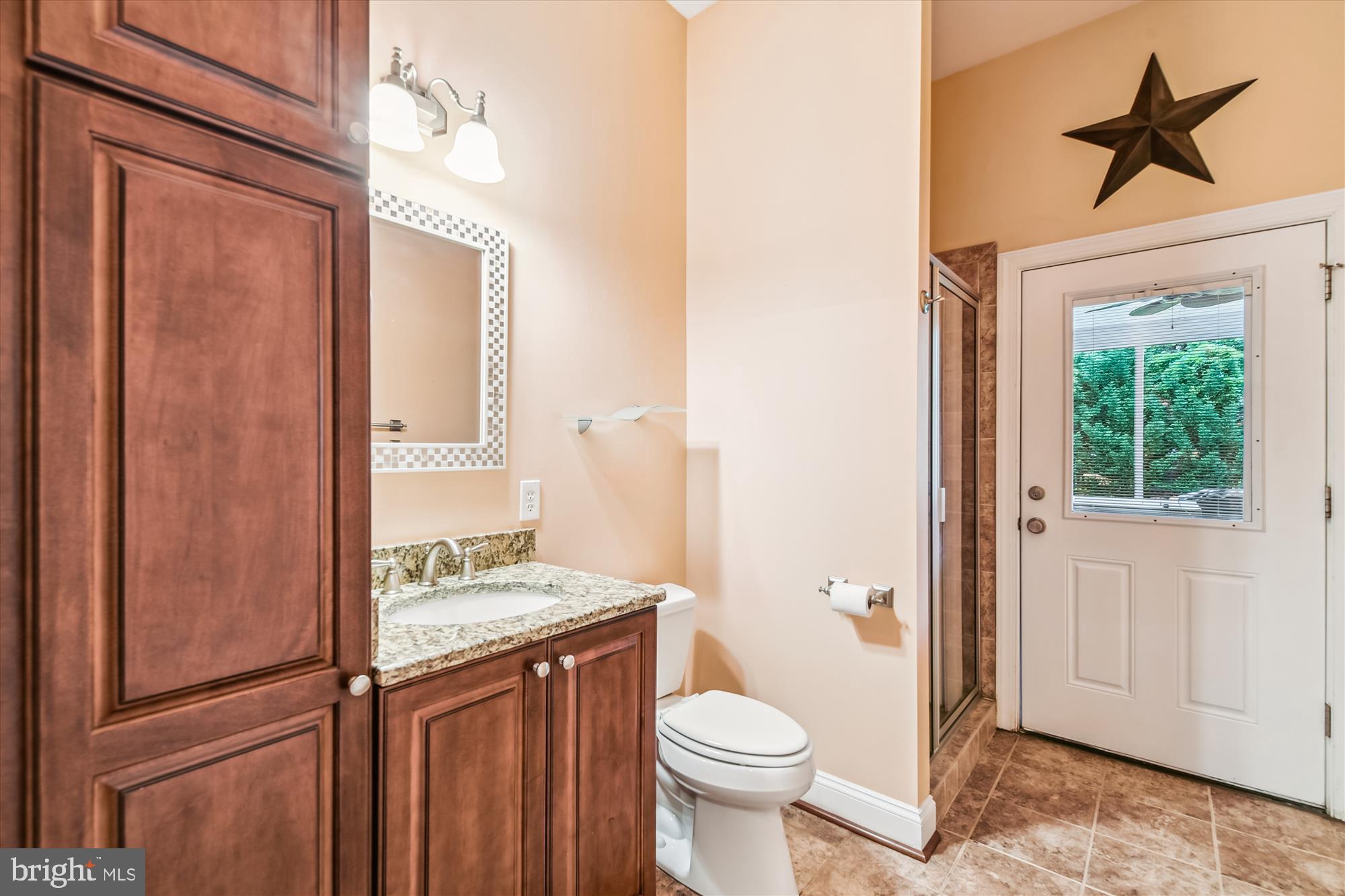 222 Wicklow Road Glen Burnie, MD 21061 - Photo 30 of 39 a bathroom with a granite countertop sink toilet and shower