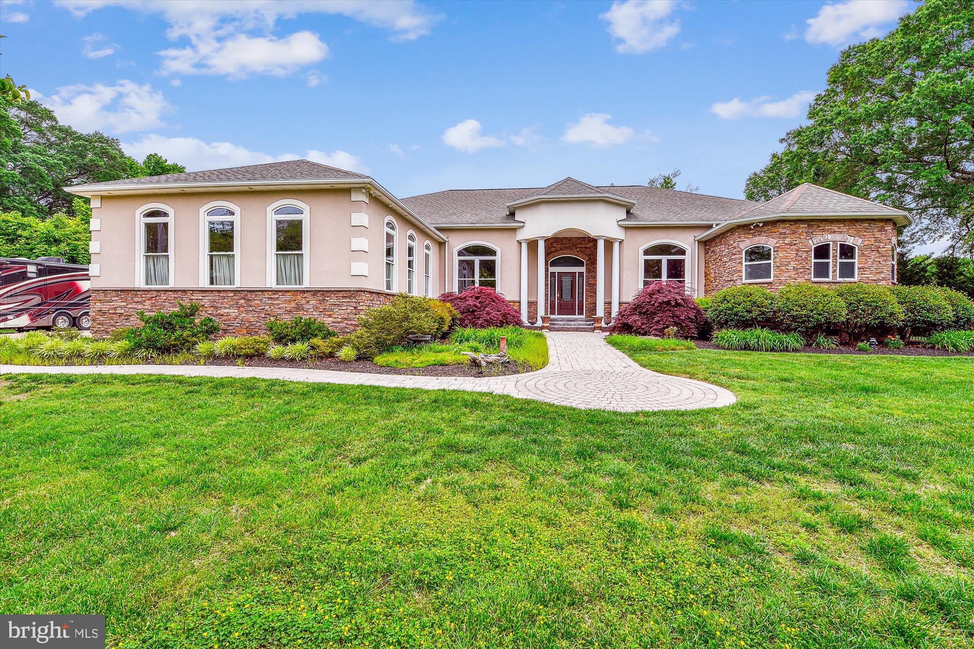 222 Wicklow Road Glen Burnie, MD 21061 - Photo 39 of 39 a front view of a house with a garden and trees