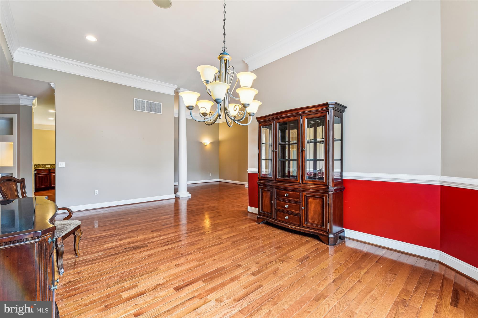 222 Wicklow Road Glen Burnie, MD 21061 - Photo 10 of 39 a view of a room with wooden floor and staircase