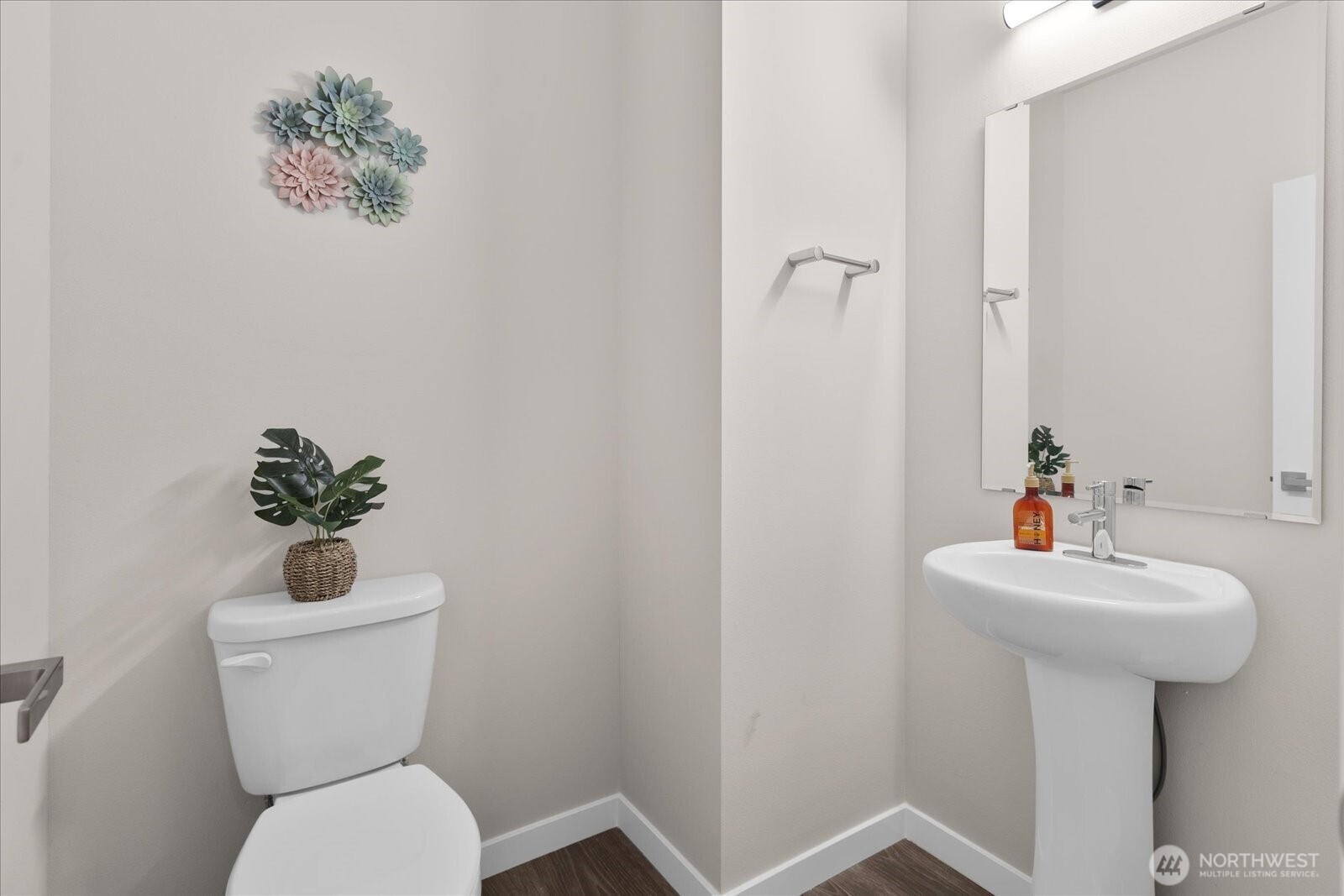 23413 Edmonds Way, Unit A2 Edmonds, WA 98026 - Photo 16 of 40 a bathroom with a toilet sink and mirror