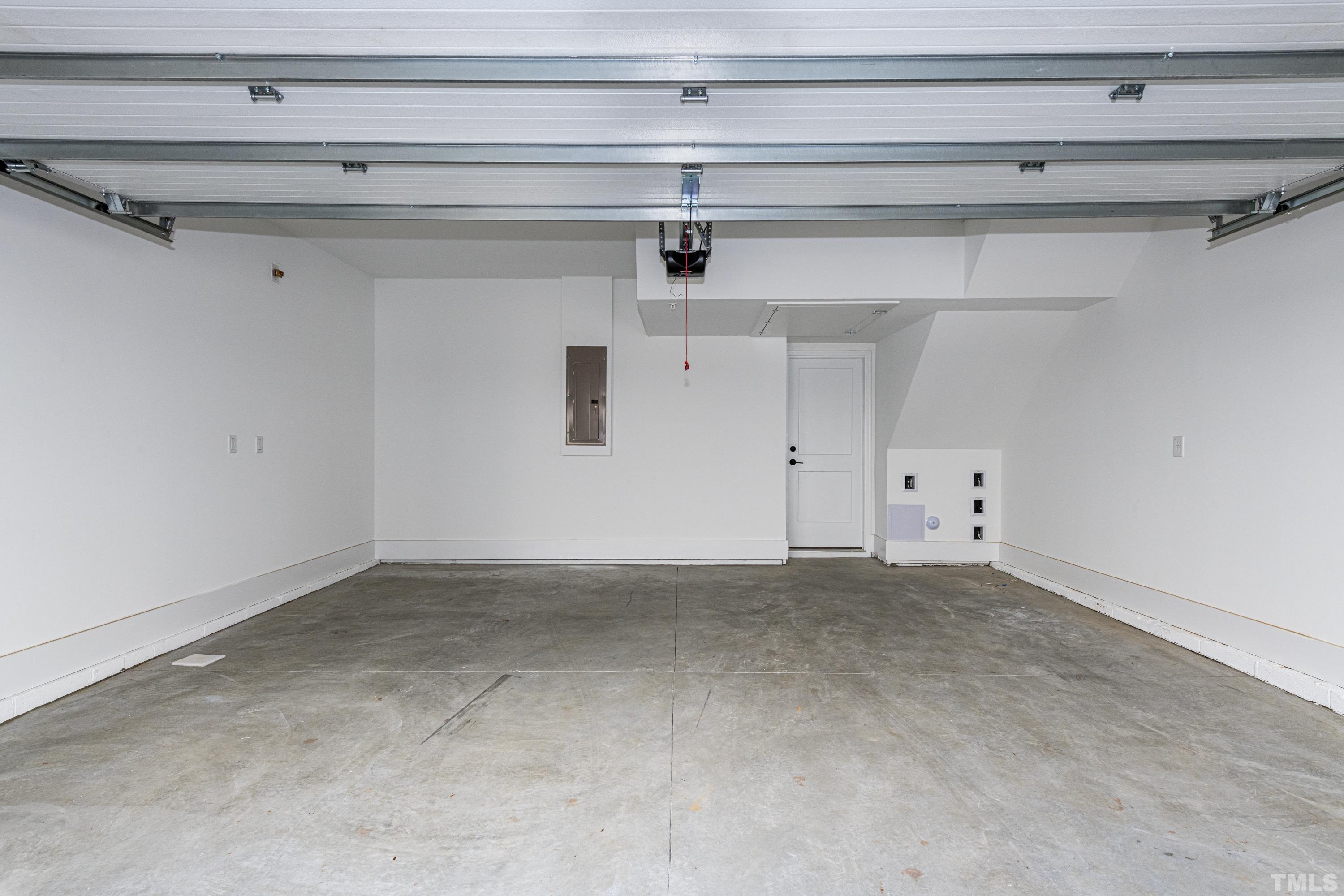 401 Bryan Pointe Drive, Unit 102 Raleigh, NC 27608 - Photo 29 of 30 a view of a garage