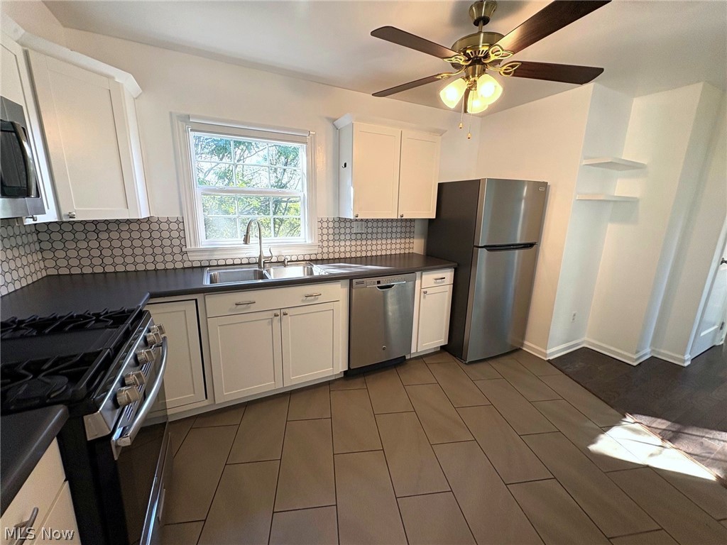 140 Harding Street Weirton, WV 26062 - Photo 5 of 11 Kitchen featuring appliances and ceiling fan