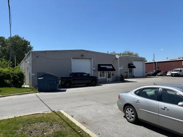 a view of a car parked in front of a house