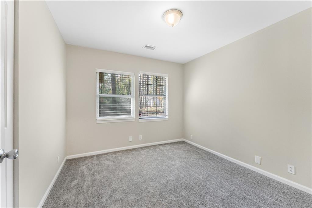 3511 Misty Valley Road Decatur, GA 30032 - Photo 9 of 16 an empty room with a window