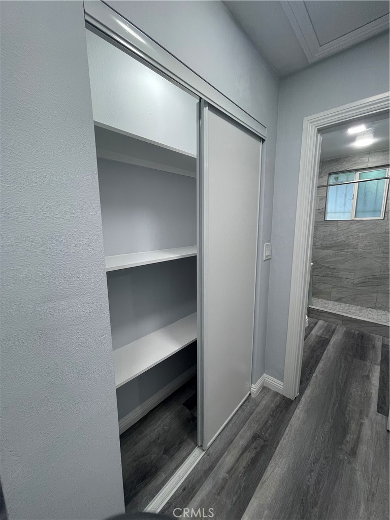 3334 139th Street Hawthorne, CA 90250 - Photo 8 of 15 a hallway view with wooden floor and staircase