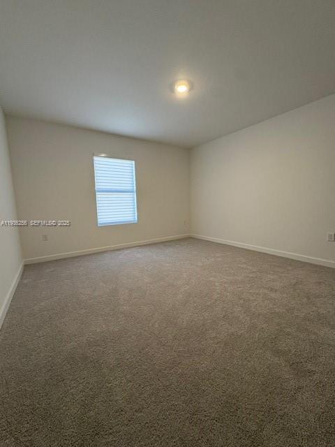 17435 Southwest 285th Street Homestead, FL 33033 - Photo 11 of 24 an empty room with windows