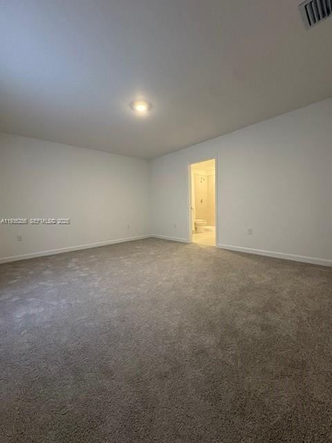 17435 Southwest 285th Street Homestead, FL 33033 - Photo 17 of 24 an empty room with a window and pillar in it