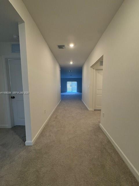 17435 Southwest 285th Street Homestead, FL 33033 - Photo 5 of 24 wooden floor and window in an empty room