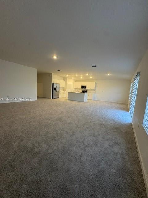 17435 Southwest 285th Street Homestead, FL 33033 - Photo 9 of 24 a view of a hallway with a projector