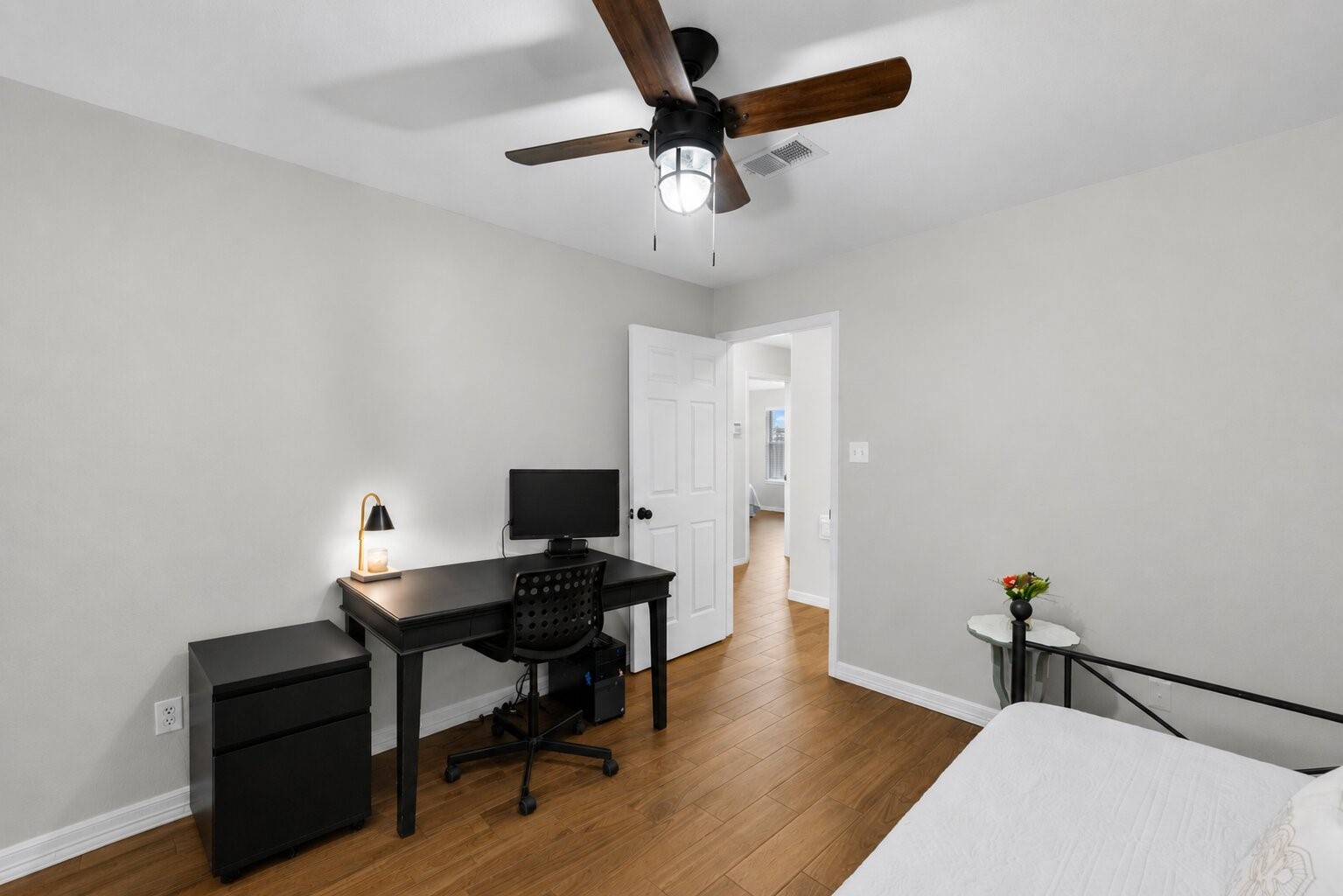 606 Walnut Street Sweeny, TX 77480 - Photo 25 of 28 a view of a workspace with furniture and a bathroom