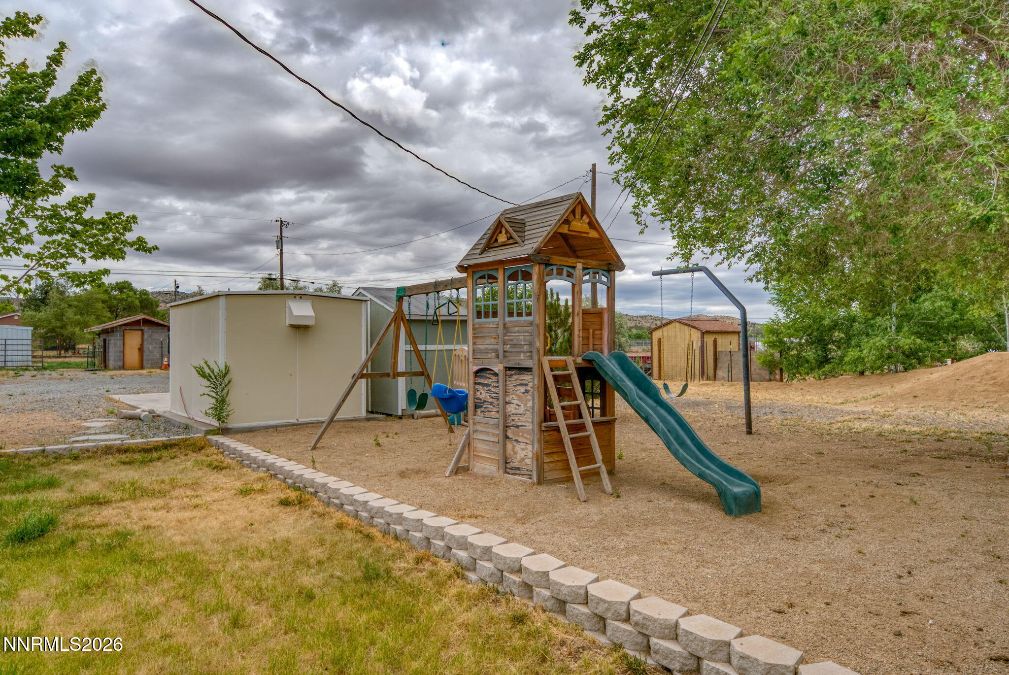 11577 Deodar Way Reno, NV 89506 - Photo 48 of 58 a house with trees in the background