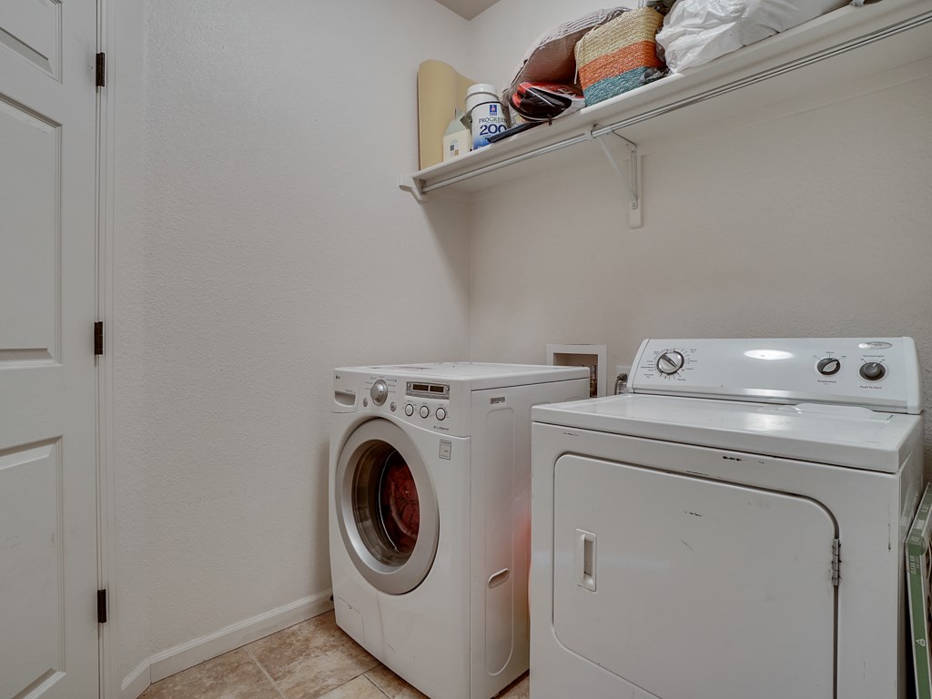 1853 Golden Ranch Road Fruita, CO 81521 - Photo 21 of 30 a utility room with dryer and washer