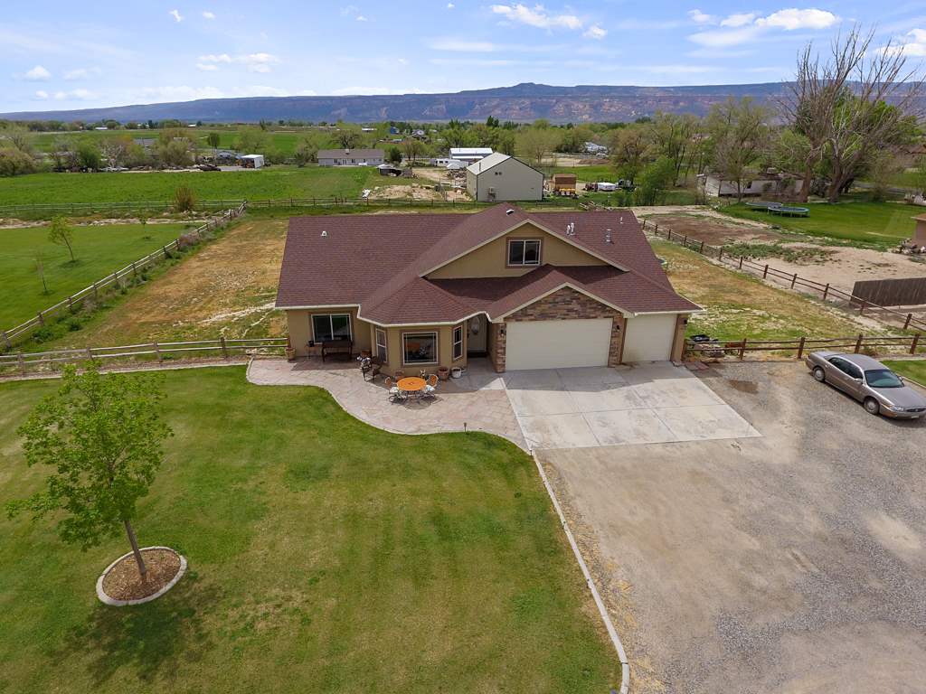 1853 Golden Ranch Road Fruita, CO 81521 - Photo 23 of 30 an aerial view of a house with garden space and ocean view