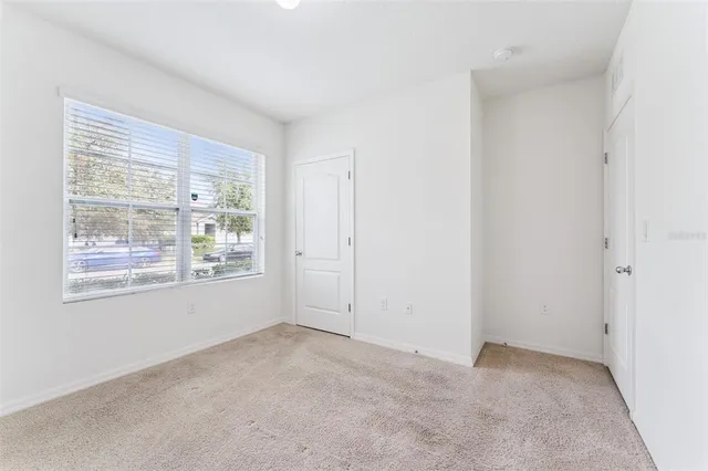 an empty room with windows