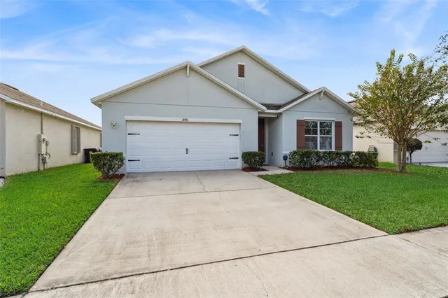 a front view of house with yard