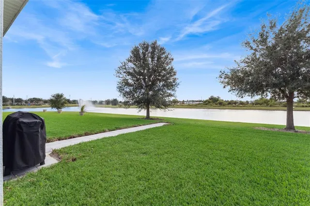 a view of a garden and basketball court