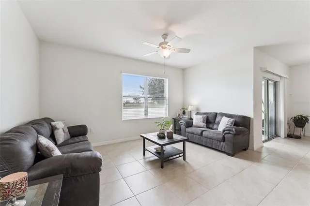 a living room with furniture and a couch