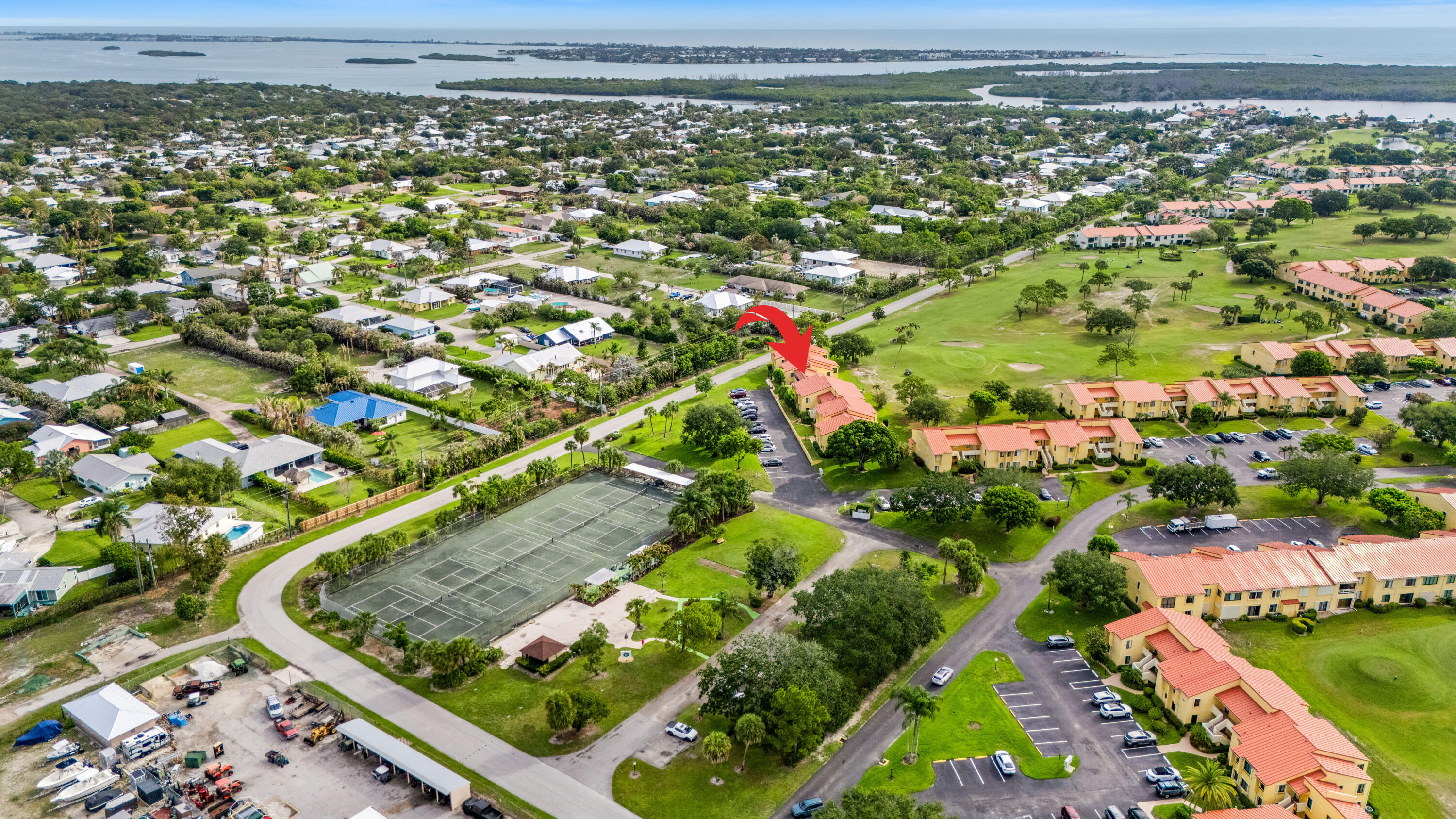 5393 Southeast Miles Grant Road, Unit 202 Stuart, FL 34997 - Photo 9 of 59 DJI_20260513090927_0594_D_Arrow