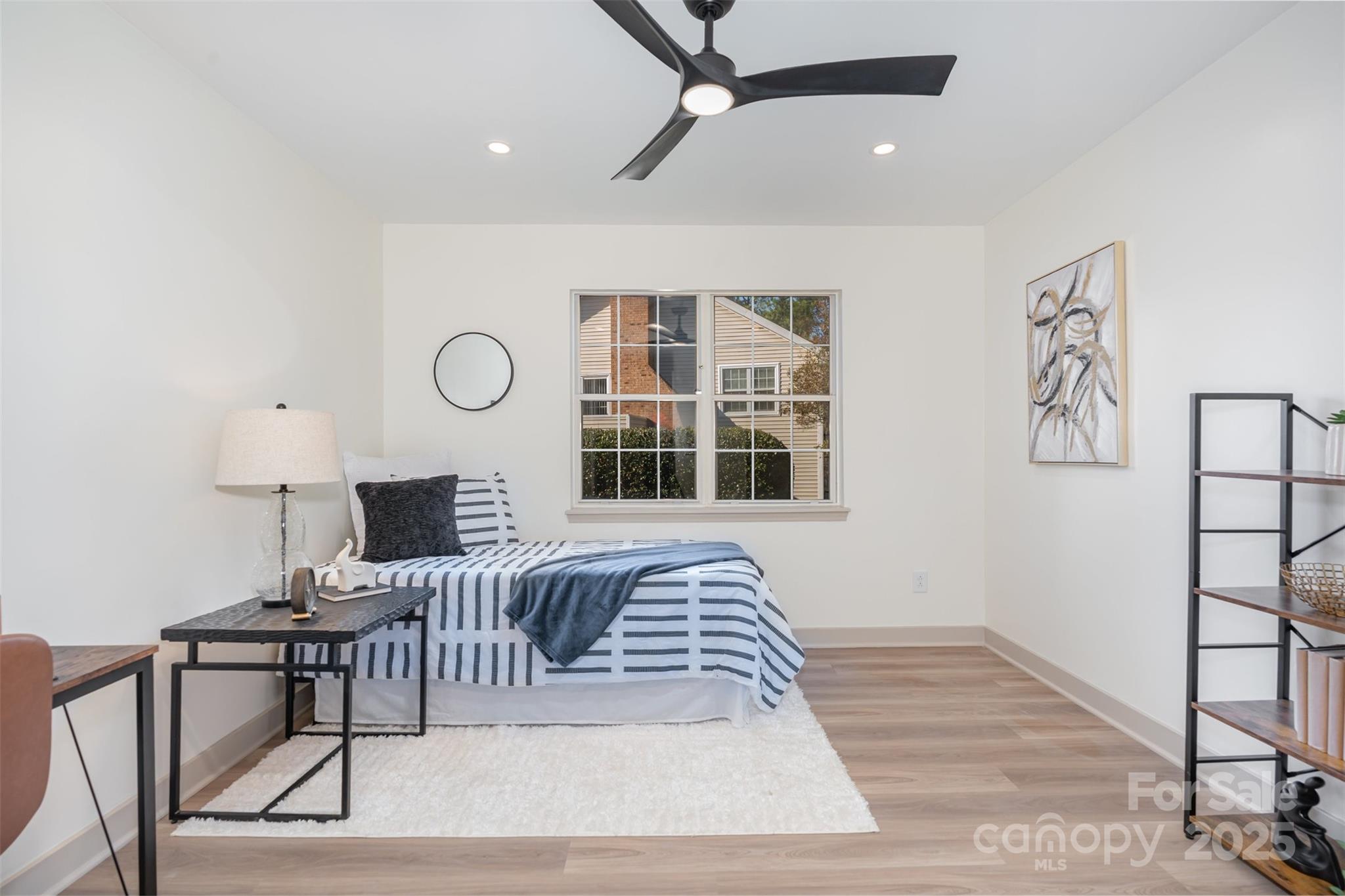 7802 Renaissance Court, Unit B Charlotte, NC 28226 - Photo 17 of 22 a view of a livingroom with furniture and window
