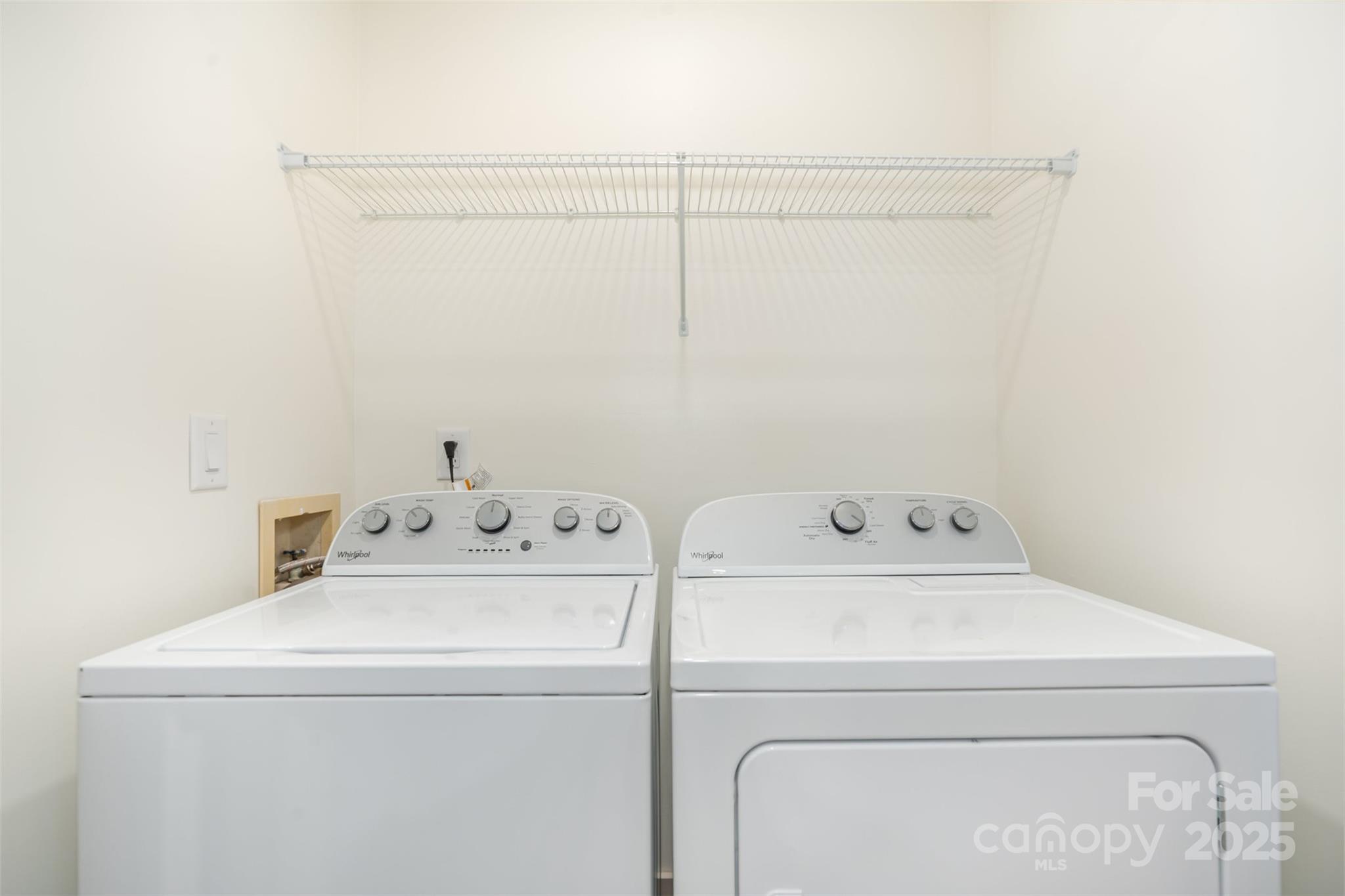 7802 Renaissance Court, Unit B Charlotte, NC 28226 - Photo 20 of 22 a utility room with dryer and washer