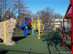 256 North Main Street, Unit D10 Spring Valley, NY 10977 - Photo 2 of 7 View of communal playground
