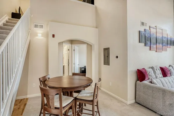 a view of a livingroom with furniture and window