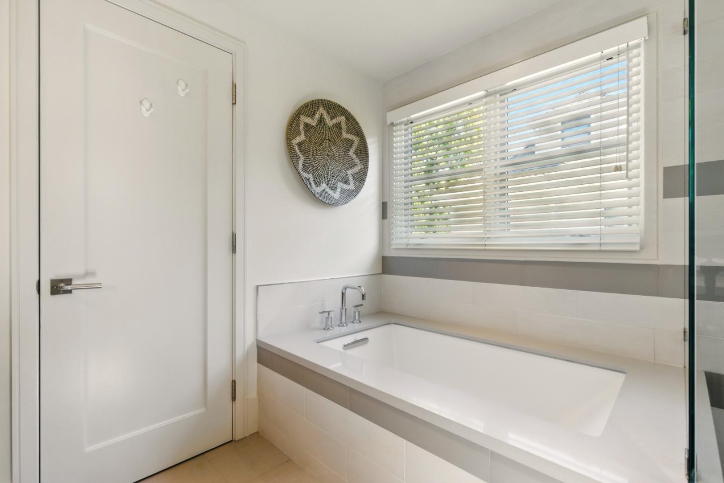 958 California Street Mountain View, CA 94041 - Photo 13 of 25 a white bath tub sitting next to a window