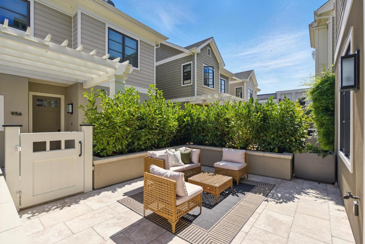 958 California Street Mountain View, CA 94041 - Photo 22 of 25 a view of a patio with couches and a table and chairs