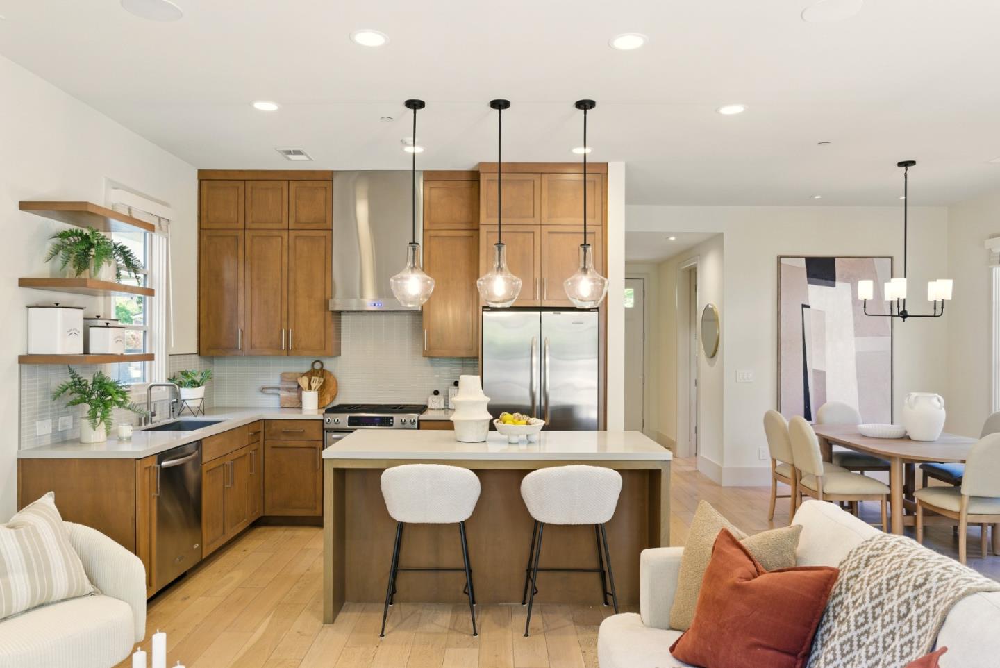 958 California Street Mountain View, CA 94041 - Photo 4 of 25 a kitchen with a sink table and chairs
