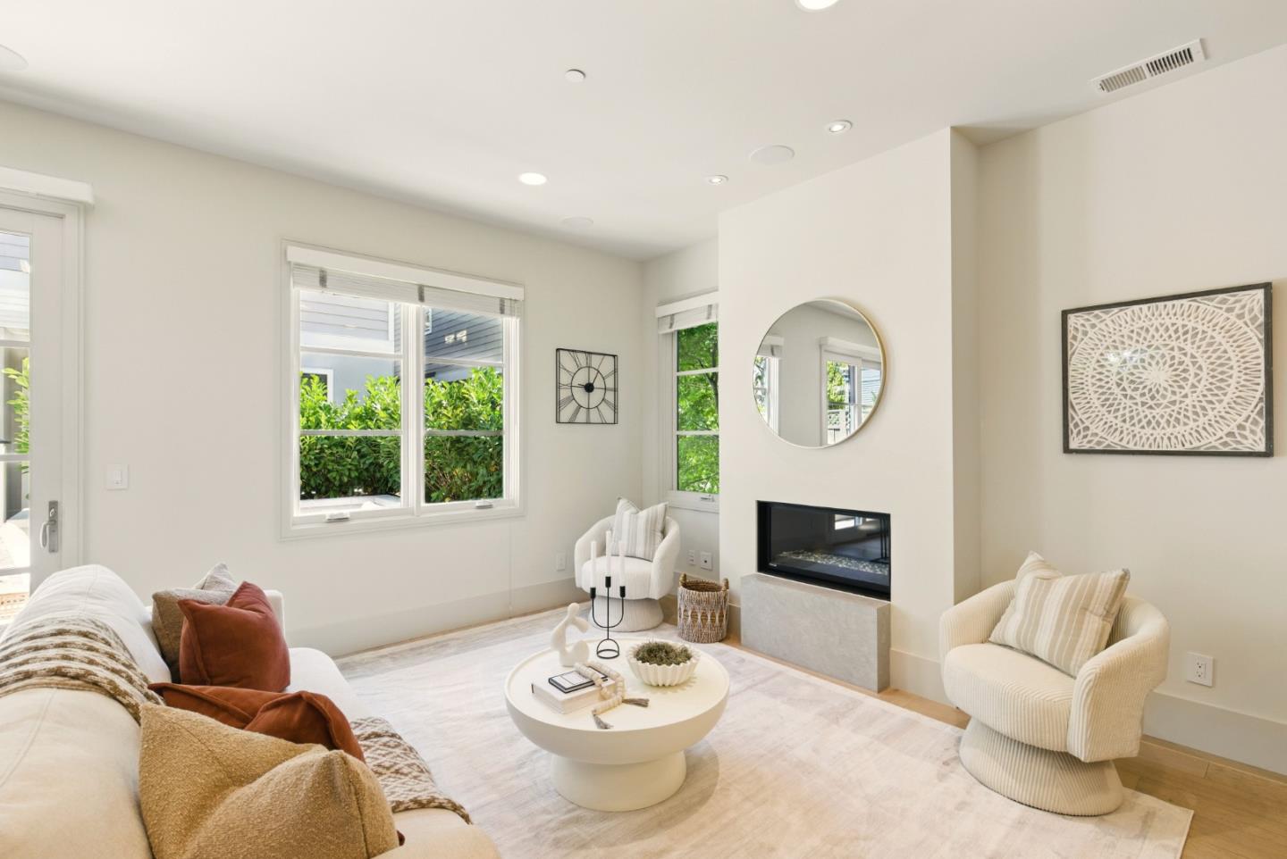 958 California Street Mountain View, CA 94041 - Photo 5 of 25 a living room with furniture a fireplace and a large window