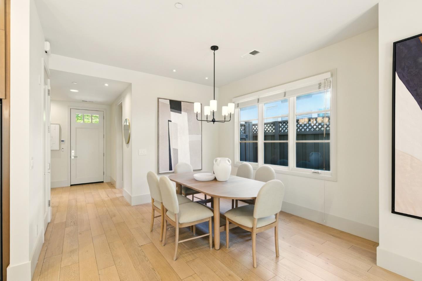958 California Street Mountain View, CA 94041 - Photo 8 of 25 a view of a dining room with furniture window and wooden floor