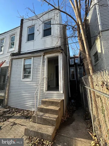 a view of a house with a street