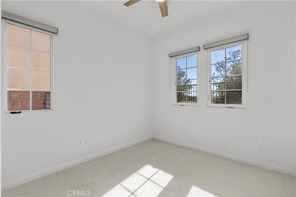 20828 Bur Oak Circle Porter Ranch, CA 91326 - Photo 12 of 43 a view of an empty room with a window