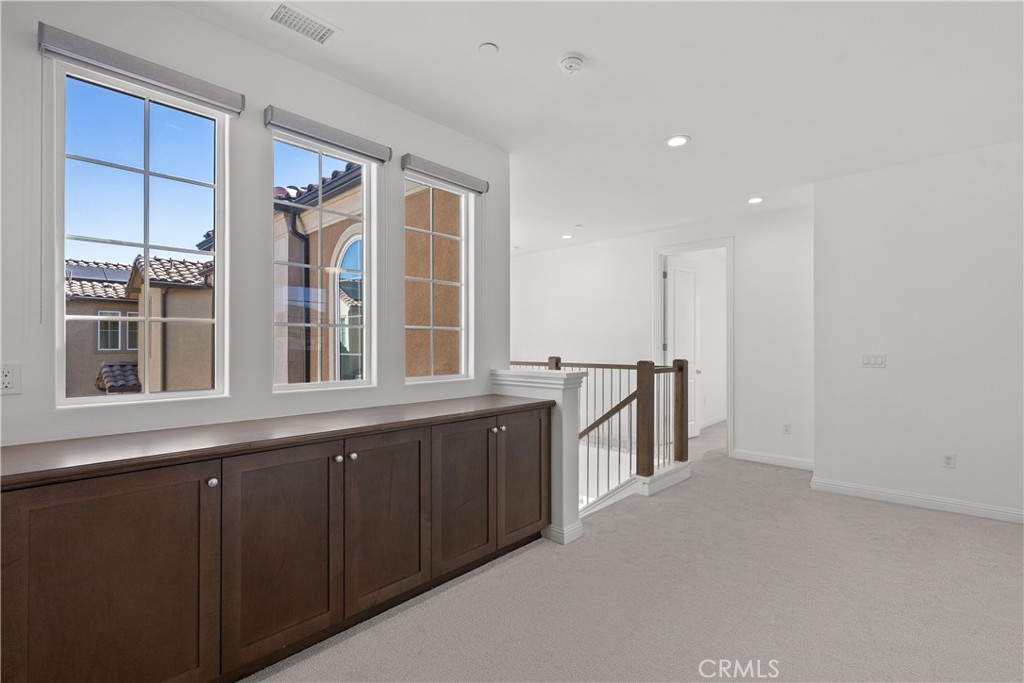 20828 Bur Oak Circle Porter Ranch, CA 91326 - Photo 23 of 43 a view of a kitchen with a sink