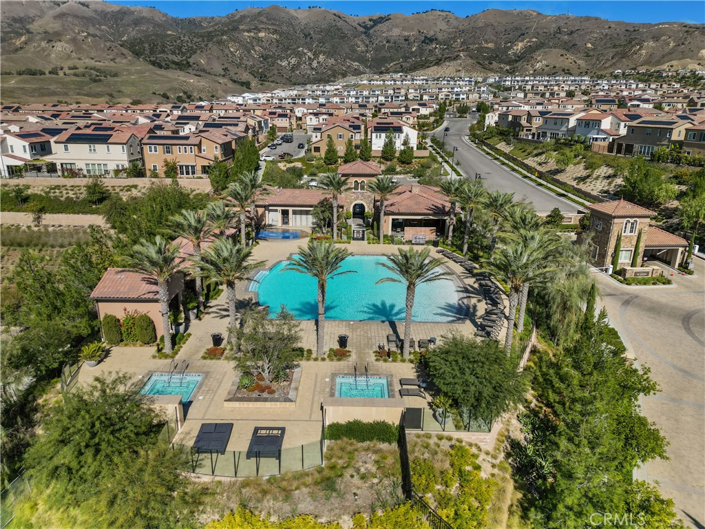 20828 Bur Oak Circle Porter Ranch, CA 91326 - Photo 38 of 43 an aerial view of residential houses with outdoor space and parking