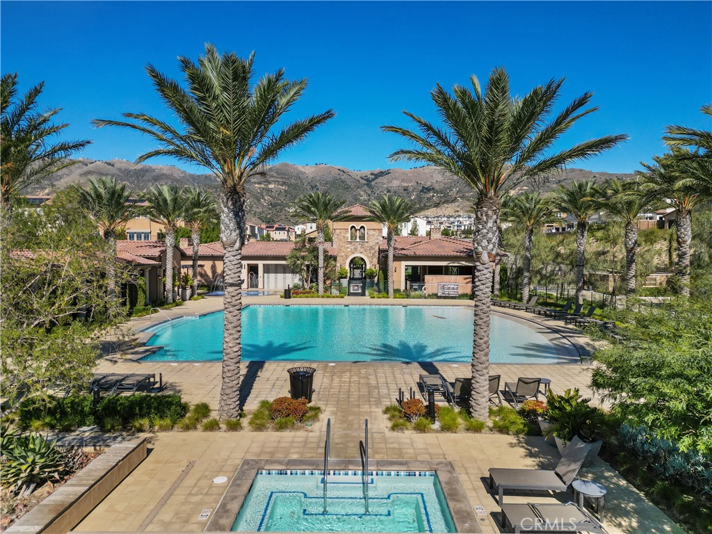 20828 Bur Oak Circle Porter Ranch, CA 91326 - Photo 40 of 43 a view of a house with a swimming pool