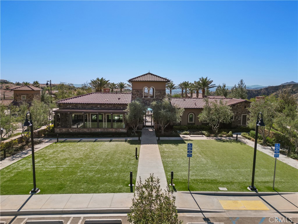 20828 Bur Oak Circle Porter Ranch, CA 91326 - Photo 42 of 43 a view of a house with a swimming pool