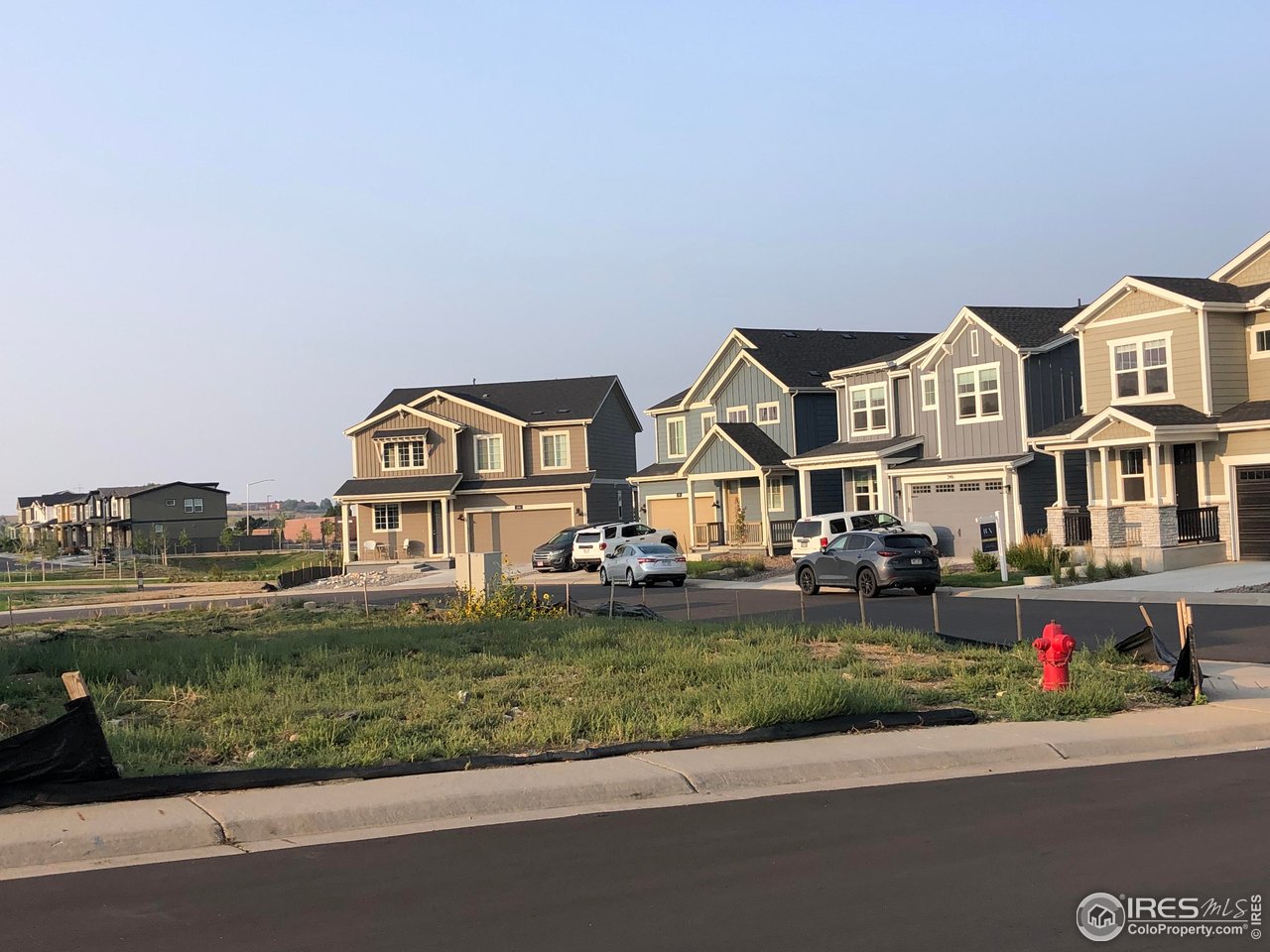 103 Cayauga Way Superior, CO 80027 - Photo 3 of 9 a front view of a house with garden