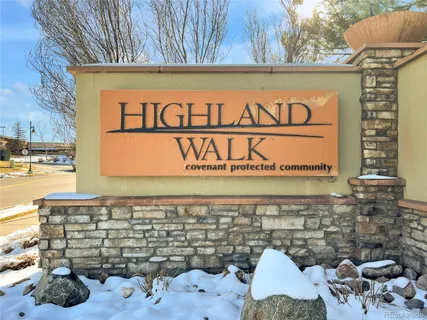 a sign on the wall of building